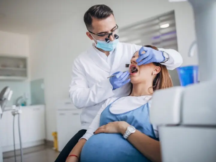 Pregnant woman having a dental check up