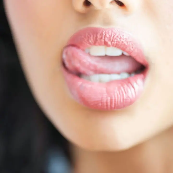 periodontics gum disease treatment Melbourne dentist Essendon patient feeling gums with tongue periodontics gum disease treatment Melbourne dentist Essendon patient feeling gums with tongue
