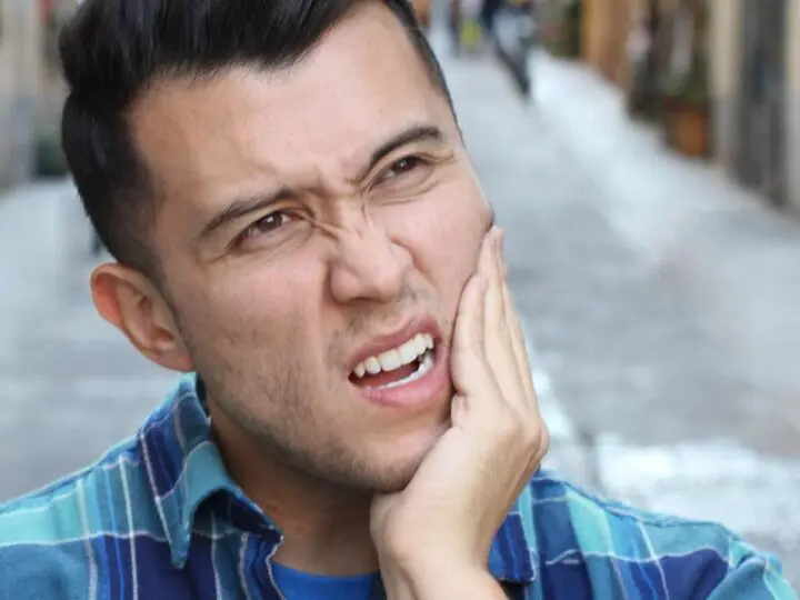 Causes TMJ dysfunction disorder Melbourne dentist Essendon patient with headaches migraines caused by facial jaw pain and TMD Causes TMJ dysfunction disorder Melbourne dentist Essendon patient with headaches migraines caused by facial jaw pain and TMD
